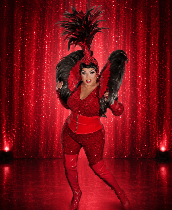 TP Lords in a glamorous red performance look at Palace South Beach in Miami Beach